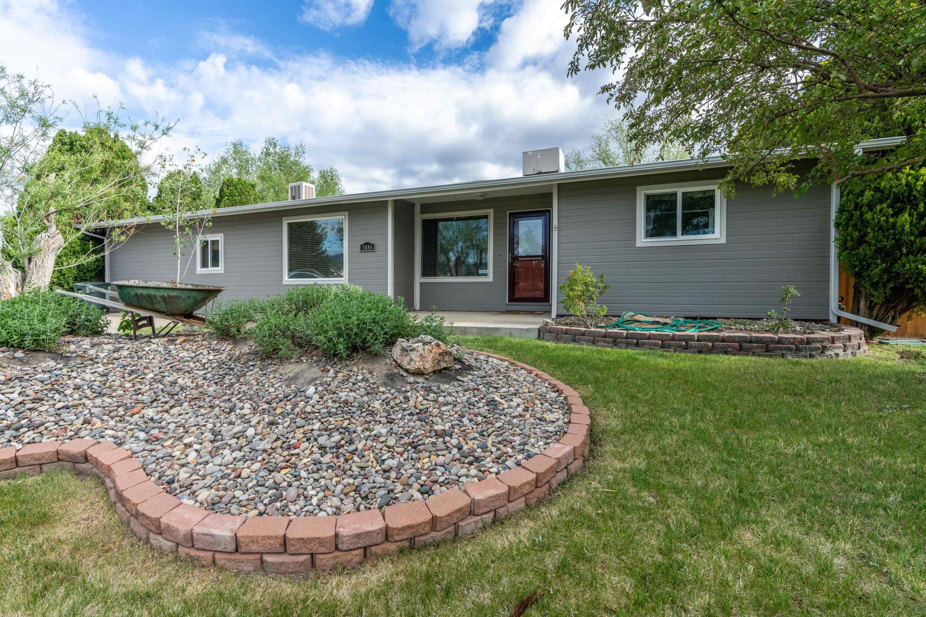 OPEN HOUSE! Sunday, July 28th from 11:30 AM - 1:30 PM Hobby farm with ample parking and room for RV and toys on 1.47 acres. As an added bonus the RSF-4 property may have the potential for an Accessory Dwelling Unit (ADU) or to be subdivided! Come see this updated ranch-style home, featuring a brand new roof, energy-efficient vinyl windows, new dishwasher, fresh exterior paint and deluxe chicken set up. Step inside to find tongue and groove accents that bring warmth and style. The detached garage offers additional storage, while the heated and cooled detached bonus room (not counted in square footage) is an ideal craftroom, office, gym, or classroom. Come experience country living while still being conveniently located near amenities! Seller offering $10,000 towards interest rate buy down for a huge cost savings to buyer!
