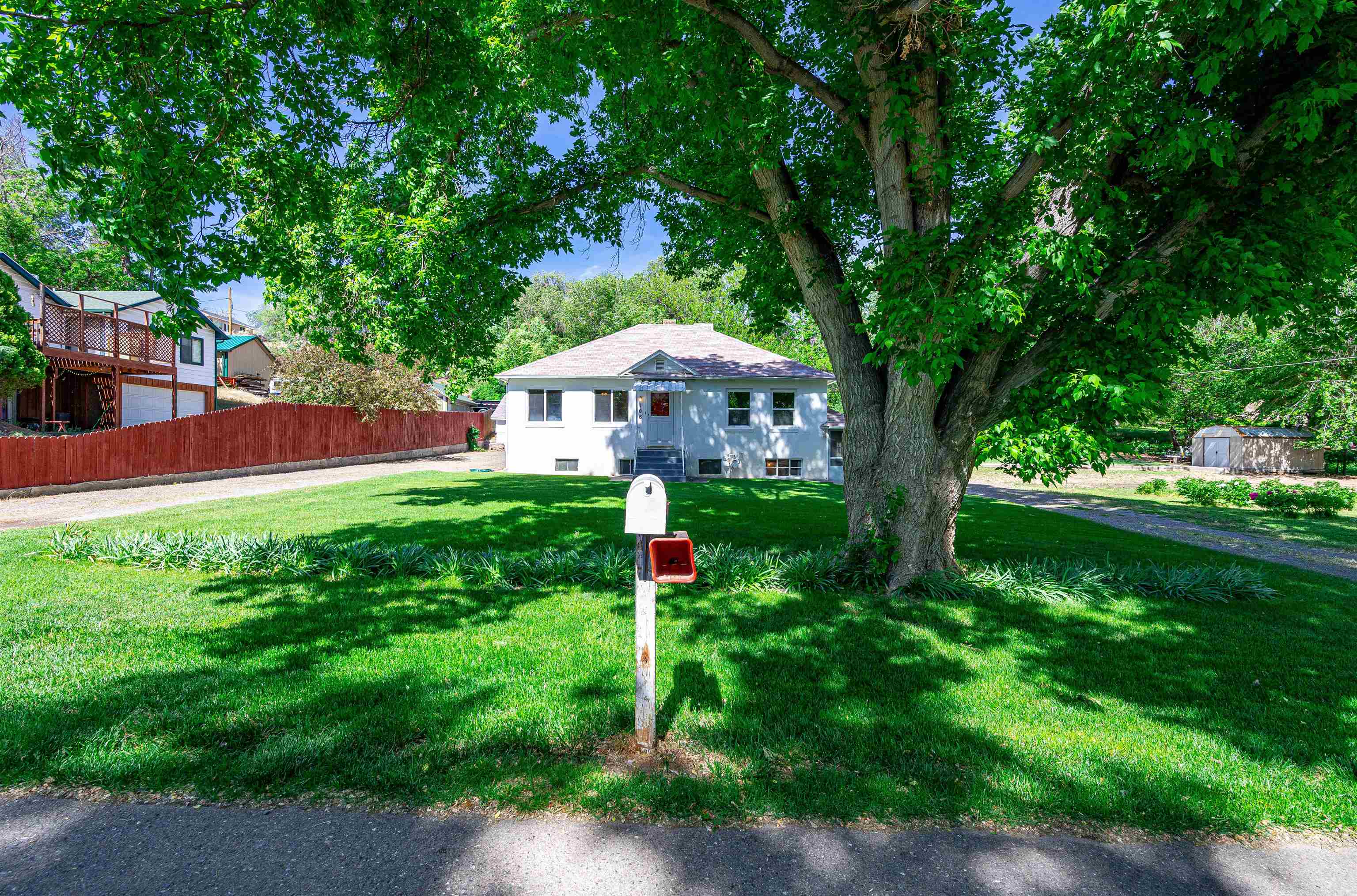 Looking for your oasis in the Redlands? Well look no further. Come see this beautiful 3 bedroom, 3 bathroom home, on just over a half acre with no HOA. You’ll love the original hardwood floors, large garden, the detached 2 car garage with workshop, and the ample shade all the many trees provide. There is also the ability to have a mother in law suite or rental in the basement as it has a separate entrance and kitchen. Comes with 2 shares of irrigation water and 3 sheds for all your storage needs. It’s also close to the Lunch Loops Trail System, grocery, restaurants, and just a quick 5 minute drive to downtown Grand Junction. Schedule your showing today!