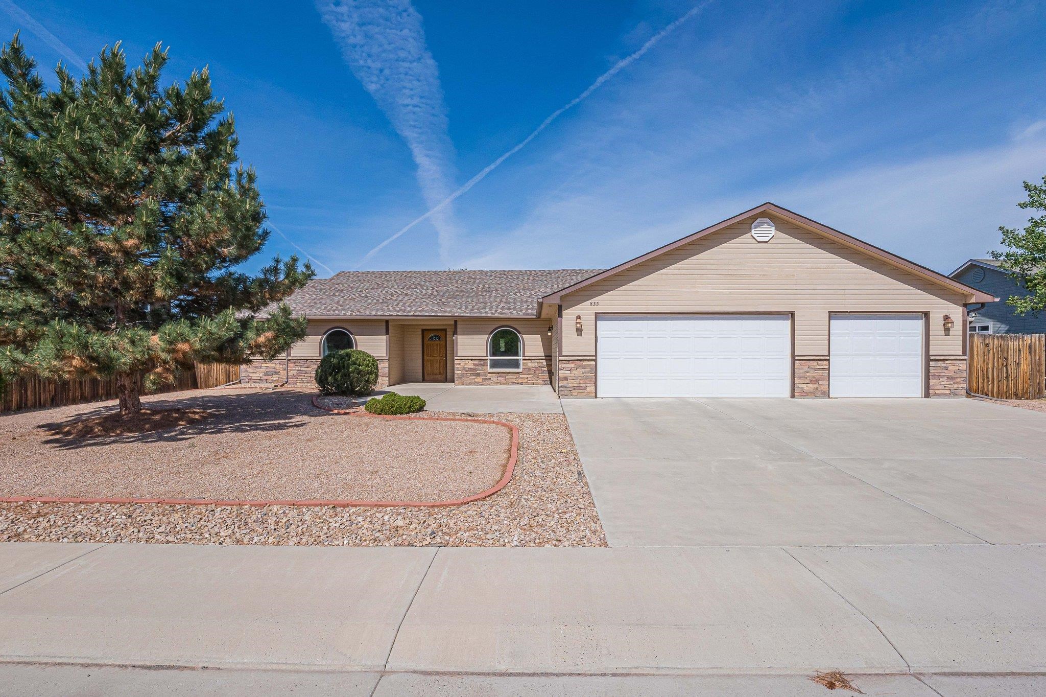 Back on market, no fault of the home.  This spacious 3-bedroom, 2-bathroom residence includes a versatile office space, perfect for remote work or a quiet retreat.  Located in a desirable Fruita neighborhood, this home backs to a serene natural habitat, providing a private and picturesque backdrop for your everyday living. The inviting interior features an open floorplan with abundant natural light, a kitchen with a large pantry and plenty of entertaining space, and a cozy living room with an EPA approved woodburning fireplace.  The master suite offers a private en-suite bathroom and ample closet space, while the additional bedrooms are generously sized and ideal for family or guests.  There are numerous closets and a 3-car garage for all of your storage needs.  Step outside to your beautiful patio, where you can enjoy morning coffee or evening gatherings while taking in the tranquil views of nature and wildlife.  There are raised garden beds and RV parking.  For outdoor enthusiasts, this home is conveniently situated near scenic biking and walking trails, making it easy to embrace an active lifestyle.