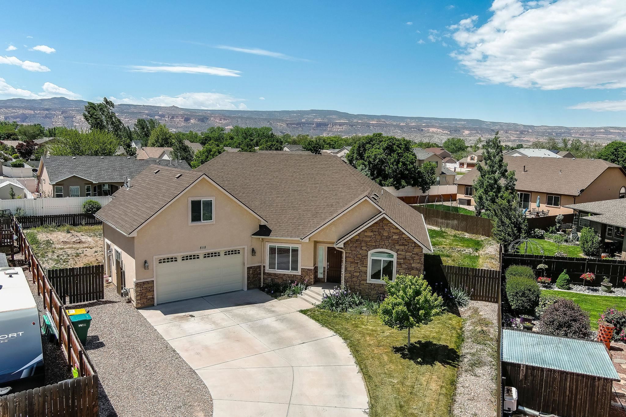 Welcome to your stunning new home in the sought-after northern area of Fruita! This meticulously crafted 2289 sq ft residence offers 4 bedrooms, 2 bathrooms, and an abundance of upscale features. Step into the modern kitchen, equipped with high-end appliances and ample counter space. The luxurious master suite provides a peaceful retreat with its spa-like ensuite bathroom and ample closet space. Outside, the expansive backyard provides ample space for outdoor activities and gatherings. Enjoy breathtaking views of the surrounding landscape and take advantage of the nearby walking trails, perfect for leisurely strolls or morning jogs. As part of the Vintner's Farm Subdivision, residents also have access to the scenic 3 1/2 Acre Pond and Playground Area, adding to the community's charm and recreational opportunities. Buyers are encouraged to verify all information, as details are subject to change/error. Don't miss out on the chance to create your perfect oasis in this desirable community.