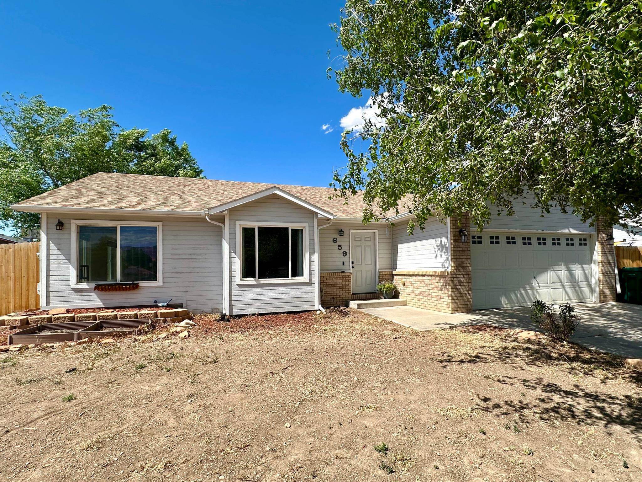 Great location for this 3 Bed / 2 Bath Ranch style home in Fruita.  You have to get inside to truly appreciate everything that this property has to offer including beautiful floors and other recent updates to the home.   There is a large living area along with a spacious dining / sun room located just off of the Kitchen.  The Primary  Suite includes an oversized walk-in shower and large walk-in closet.   The exterior of the property has a covered patio and a fully fenced backyard area.  All appliances are included in the sale of the property.  The yard is a blank canvas waiting for the new homeowners to showcase their own personal design preference.