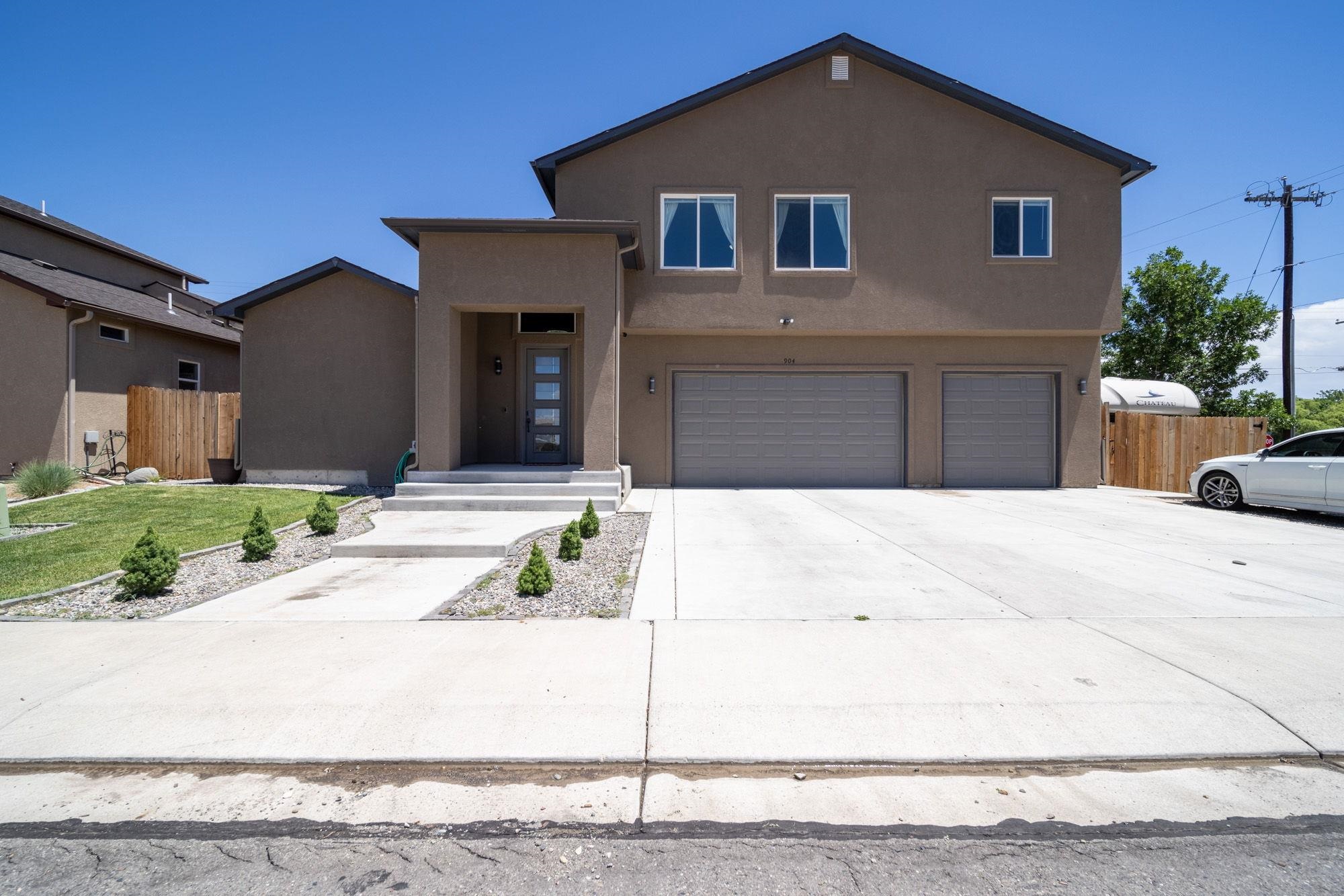 Welcome to this stunning two-story home situated on a prime corner lot in the charming town of Fruita, CO. Designed with an open floor plan, this home is perfect for entertaining! Enjoy stylish and durable wood laminate flooring throughout the main living areas. Bathed in natural sunlight, the living room offers a cozy gas log fireplace, adding both ambiance and warmth. The heart of the home features a spacious center island, abundant cabinet storage, and a walk-in pantry for additional space.Located on the main level, the primary bedroom boasts an attached 5-piece bath with a luxurious jetted tub, dual vanities, and an oversized walk-in closet. An additional bedroom and a full bathroom are also conveniently situated on the main level. Upstairs, you'll find a versatile family room or flex space, plus two more bedrooms and additional bathroom; perfect for guest quarters or privacy bedrooms, away from the hustle & bustle on the main level. In the garage you will find a Source water purification system that also comes with the house. The large backyard is a true retreat, featuring a covered concrete patio and an open deck area, ideal for relaxing or hosting summer BBQs. There’s ample opportunity to create your dream backyard oasis. The hot tub is already here and ready!! Enjoy the proximity to Downtown Fruita’s shopping, restaurants, local hangouts, and entertainment. Plus, you're just a short trip away from the area’s renowned hiking and biking trails. Don’t miss the chance to make this exceptional property your new home!