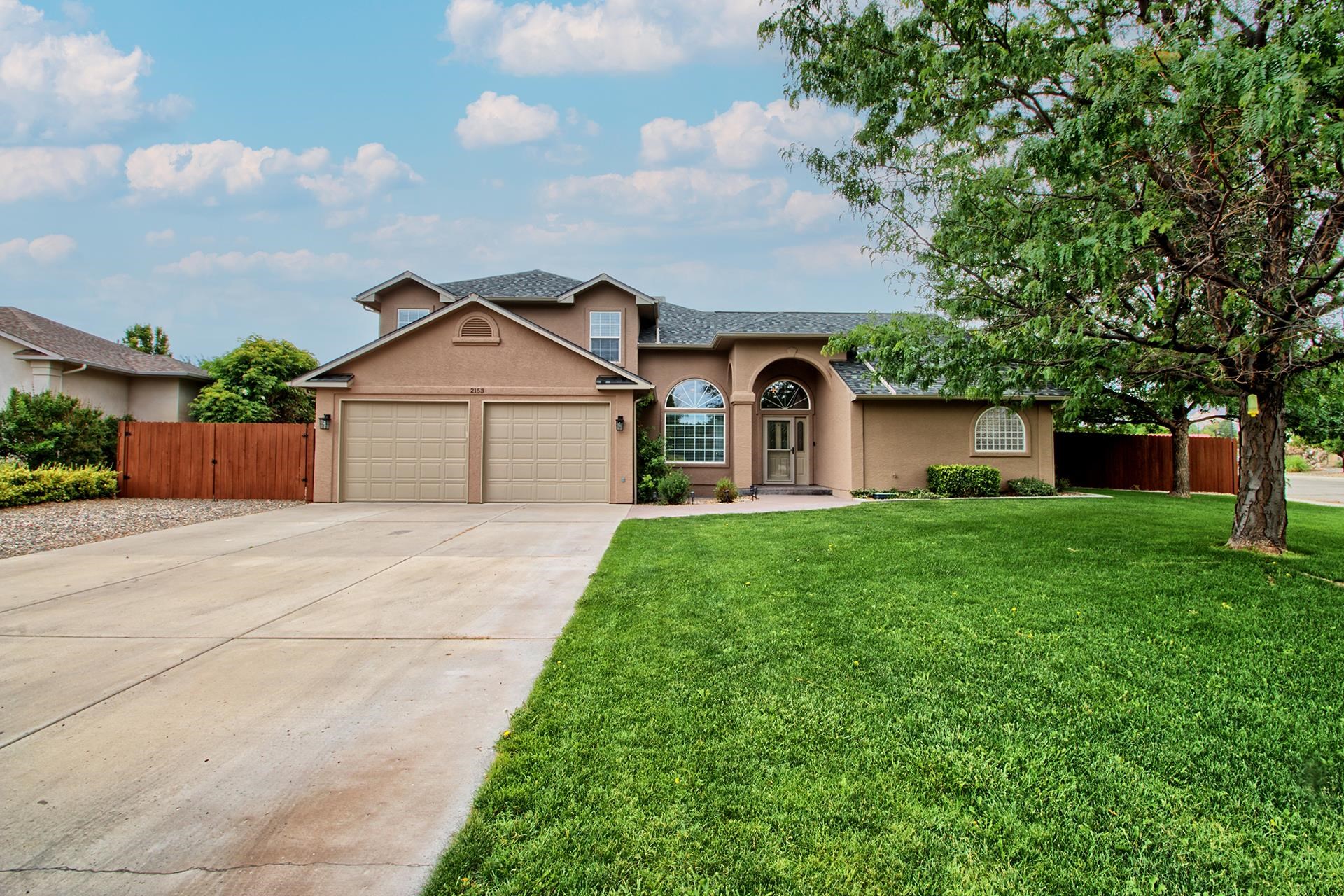 Almost 2,600 sq. ft. and all this new stuff!!  New roof, new gutters, new exterior paint, new flooring, new paint inside, new primary bath, new window coverings and now looking for new owners!  This floor plan is perfect!  Primary bedroom with an elegant 5 piece bathroom on the main floor.  Office, living room, dining, kitchen with a breakfast bar makes it so easy to entertain.  Upstairs enjoy a spacious family room, 3 other bedrooms and a full bath.  The backyard features mature landscaping, a covered patio, views and RV parking!