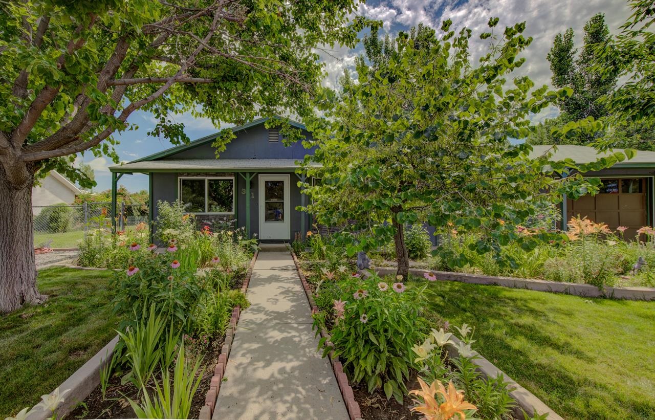 Fantastic Fruita Rancher glowing with Pride of ownership from the minute you pull up to the property.  From the beautiful garden at the front entry to the mature, well manicured landscaping surrounding your backyard patio you'll feel right at home before you ever step foot inside this gem.  The split bedroom floor plan offers privacy for everyone in the home.  With new windows throughout you'll not only feel the comfort, but hear it to.  With RV parking on a corner lot with unobstructed views you truly have it all with this property.  Just minutes away from downtown Fruita and James M. Robb State Park you'll be able to enjoy all this wonderful community has to offer!  WTF!  Come see this property today.  It won't be on the market for long.  Sellers offering a carpet allowance with an acceptable offer.