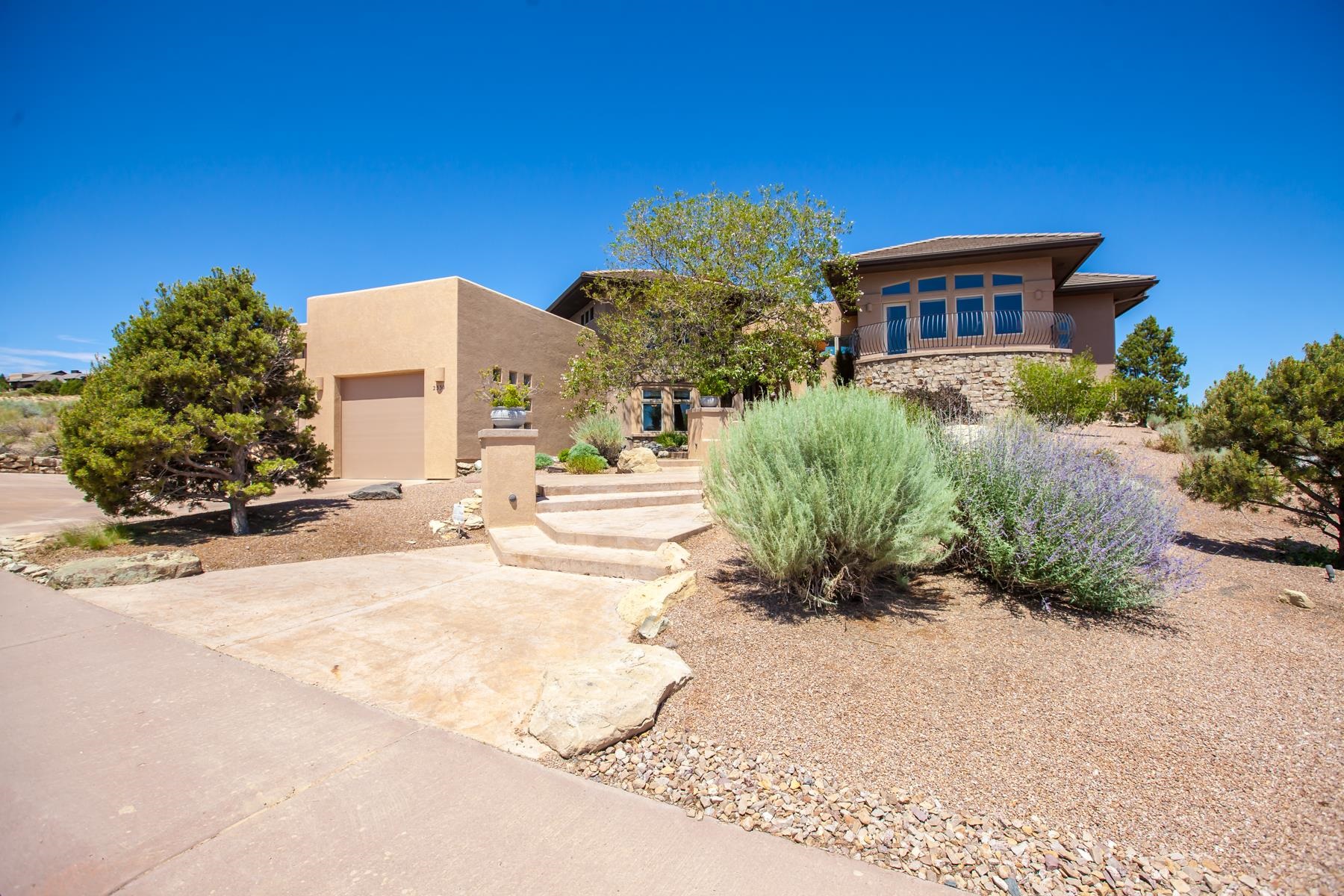 Welcome to this magnificent home, built by Chuck Lopez and situated to take in all the views of the Grand Valley. This exceptional residence has 3494 square feet, with three large bedrooms, four baths, living room, dining, family room, craft room, and an office. The kitchen has granite counter tops, knotty alder cabinets, gas range, warming drawer, wine cooler, and perfect for entertaining. Attached 3 car garage, large storage room downstairs, and an extra large crawl space and solar owned, pella doors and windows, beautiful Ash wood floors. Step outside to the wonderful patio and watch the golfers on Redlands Mesa Golf Course. Every detail in this house has been thoughtfully crafted. Joanna Little co-listing agent 970-260-5190.