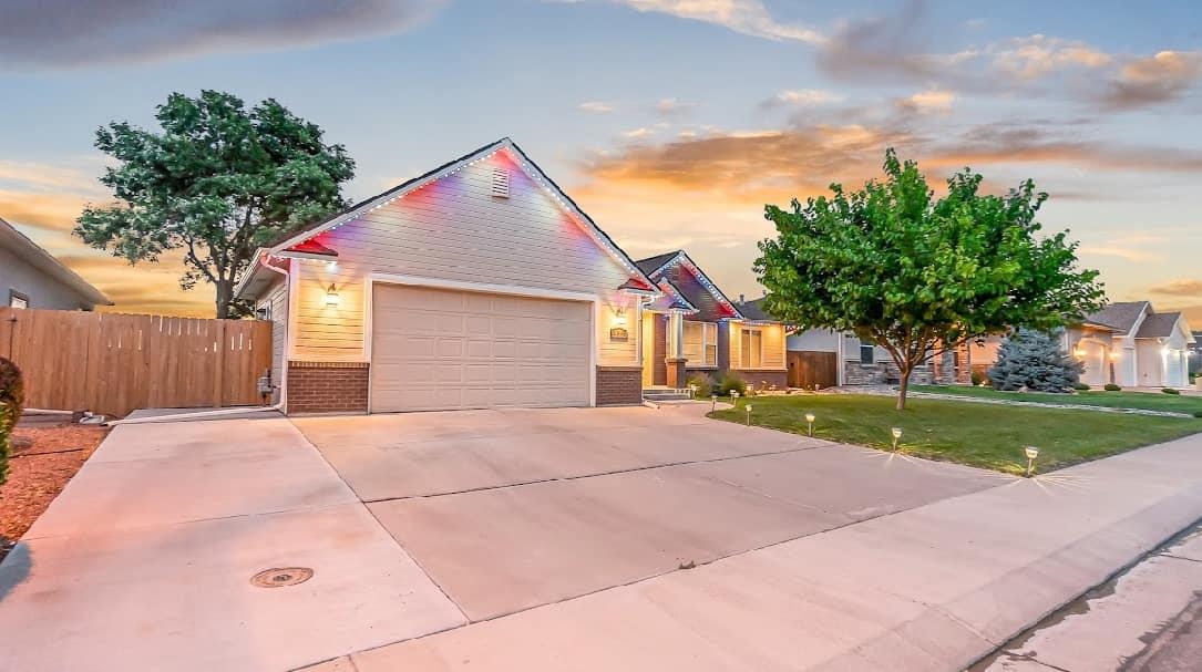 IMMACULATE and truly EXQUISITE 4-bedroom Ranch-style home in prestigious Grand Vista w/CENTRAL AIR, lots of wonderful upgrades and PRIDE IN OWNERSHIP to the 9th DEGREE!  This gorgeous home is beyond extraordinary with TWO large living spaces and STUNNING VIEWS of sunsets and the Colorado National Monument.  Backed up to ample open space and on a cul-de-sac street, the privacy and quiet splendor offered by this house is absolutely unmatched!  The OVERSIZED 2-car garage is actually OVERSIZED!  And the extra large driveway provides enough room to park three large vehicles.  NEW FURNACE, NEW A/C, NEW ROOF, NEW FENCE, granite countertops, double oven gas range for the chef, crown molding, and upgrades galore!  Two GORGEOUS fireplaces!  The spacious backyard is skillfully manicured with oversized back patio to entertain lots of impressed guests as you gaze at your incredible mountain VIEWS & glorious sunsets! There is a delightful front patio as well, where your friendly neighbors wave at one another and say hello!  At night, you can turn on your “Custom Trimlights,” in any colors you desire.  Attends some of the most sought-after schools in D51, and is close to Holy Family School and Caprock Academy.    High-end Custom "Trimlight" lights can be any color you want.  They are Red, White, and Blue for 4th of July this week.  4th bedroom is a 12 x 12 with crown molding, but is non-conforming due to not having a closet.  The two large living spaces are stunningly beautiful, each with their own fireplace, VIEWS GALORE, and spacious at 17.6 x 14.2 and 22.6 x 16.7.  All bedrooms feel spacious also.  Primary bedroom closet was custom designed. Wired for and space for a hot tub in backyard.  Buyer to verify all info and measurements.  OPEN HOUSE Sunday, July 7th from 1-3 PM!