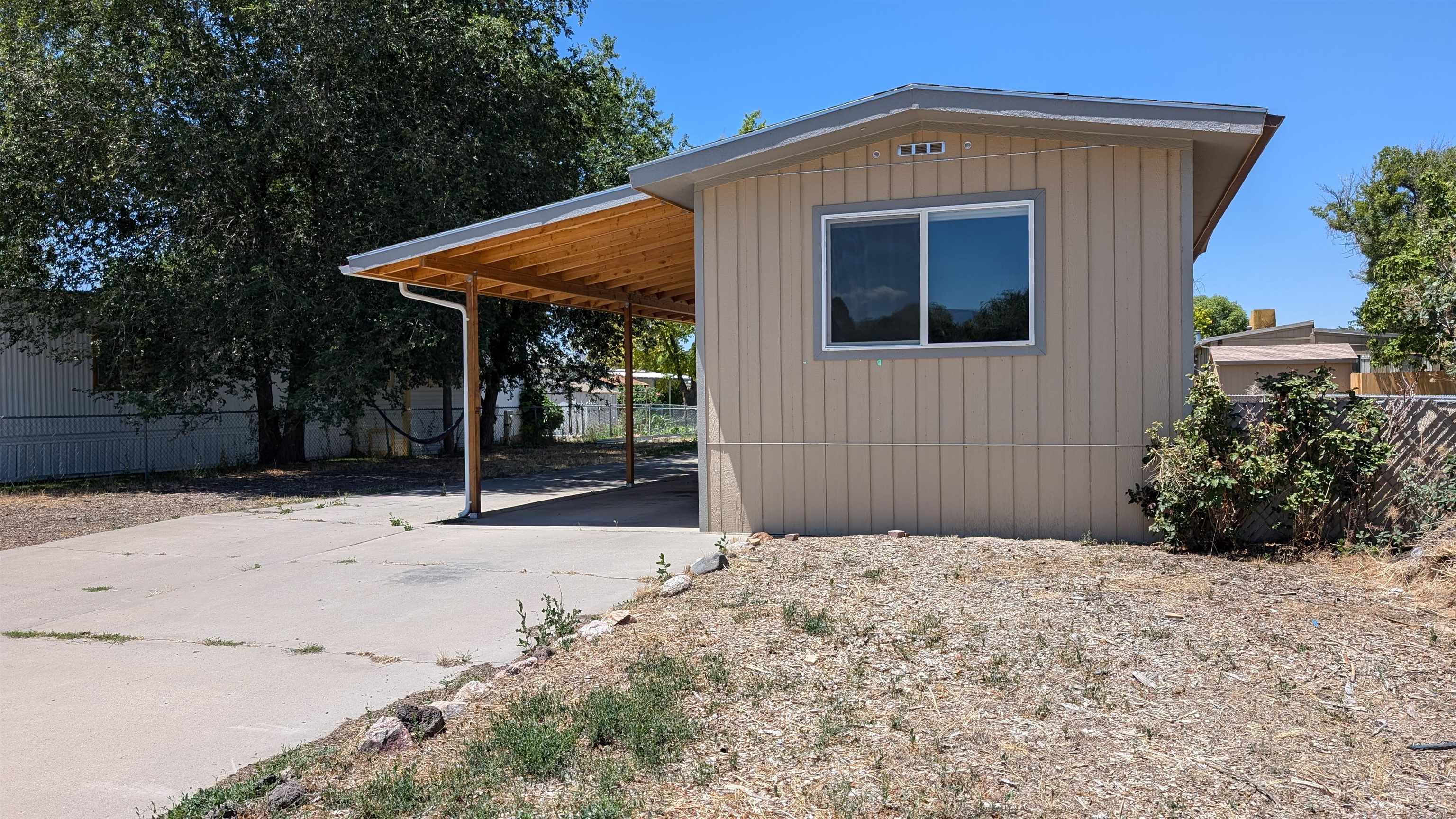 Check out this recently remodeled 1974 single wide on its own lot and no HOA, with 3 bedrooms 1.5 bathrooms. As you enter you will be greeted with an open living room, kitchen, and dining room area! Remodeled features included new roof, flooring, exterior paint and siding, bathrooms, walls, windows, kitchen cabinets and countertops. Big yard for you to create it your own. THIS PROPERTY WILL NOT GO FHA financing.