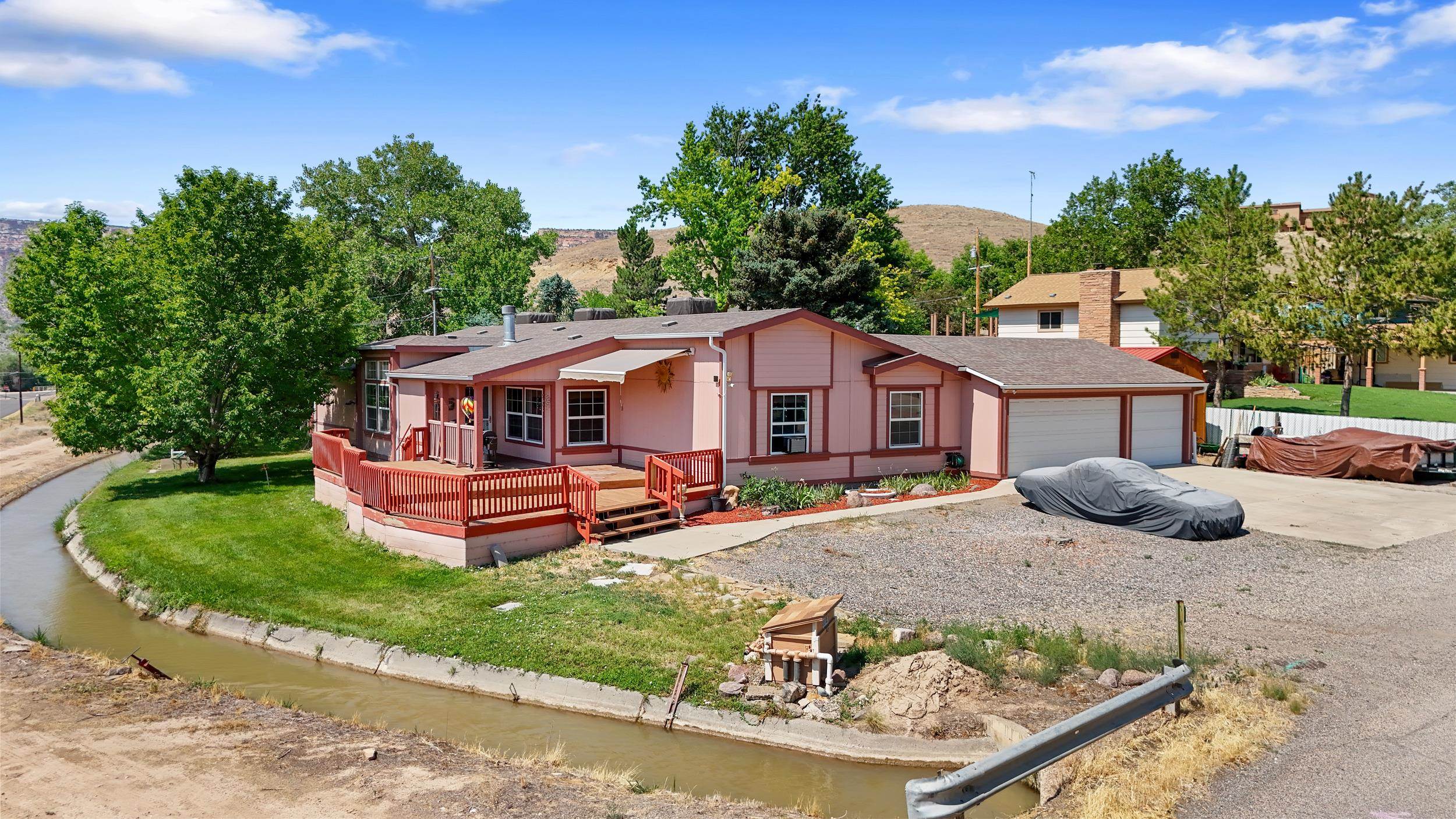 Welcome to this stunning home that has just been remodeled to perfection! This gorgeous property sits on a spacious 1.19 acre lot providing plenty of room to relax and enjoy the outdoors. With 3 bedrooms and 2 bathrooms, this home offers the perfect blend of comfort and style. One water share for irrigation, allowing you to maintain a beautiful and lush landscape. Additionally, the home is equipped with 3 new Breeze Air coolers, ensuring that you stay cool and comfortable even on the hottest days. Inside, you'll find top-of-the-line appliances that make cooking and entertaining a breeze. Whether you're hosting a dinner party or simply enjoying a quiet night in, you'll love the convenience and quality that these appliances provide. Don't miss out on the opportunity to make this dream home yours.