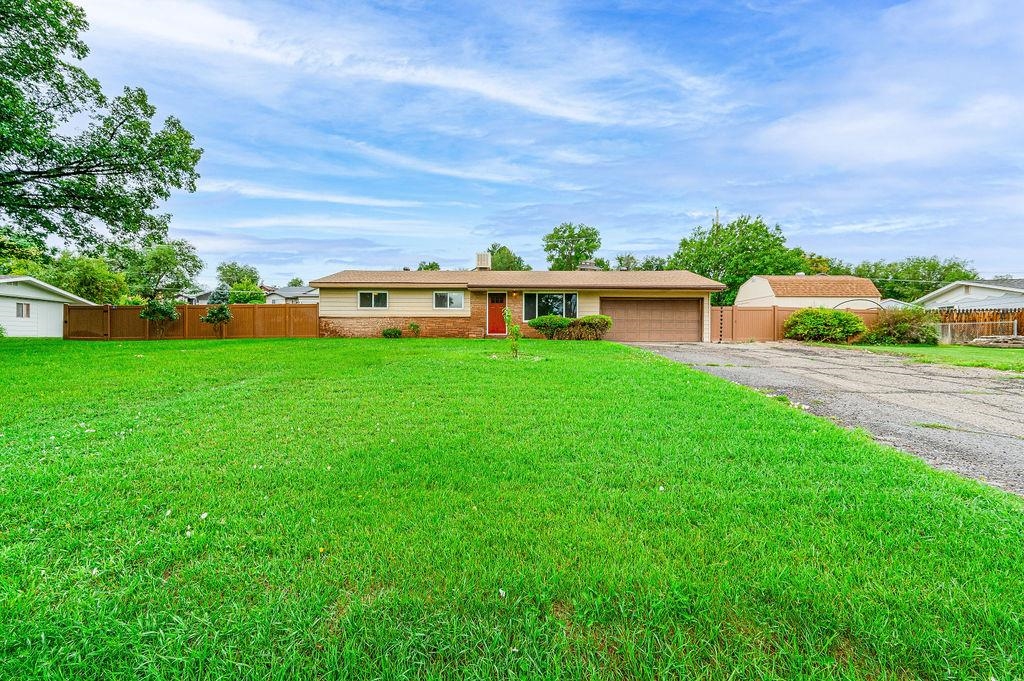 Welcome to this delightful 3-bedroom, 1 1/2-bath ranch-style home in the Redlands area! With lots of natural light and beautiful wood floors throughout, this home exudes warmth you will love. The spacious extra family room opens directly to a stunning backyard, perfect for gatherings and relaxation. Kitchen appliances stay in the home. Outside, you'll find a well-maintained space complete with a dog run, garden area, a large shed for ample storage, and a chicken coop. One share of irrigation is included to water your large fenced in yard. This home offers the perfect blend of comfort, style, and outdoor living. Don't miss your chance to make it yours—schedule a viewing today or visit the open house- Sunday 7/21/24 1-3 pm. Get your offer in after open house by 11 am Monday.