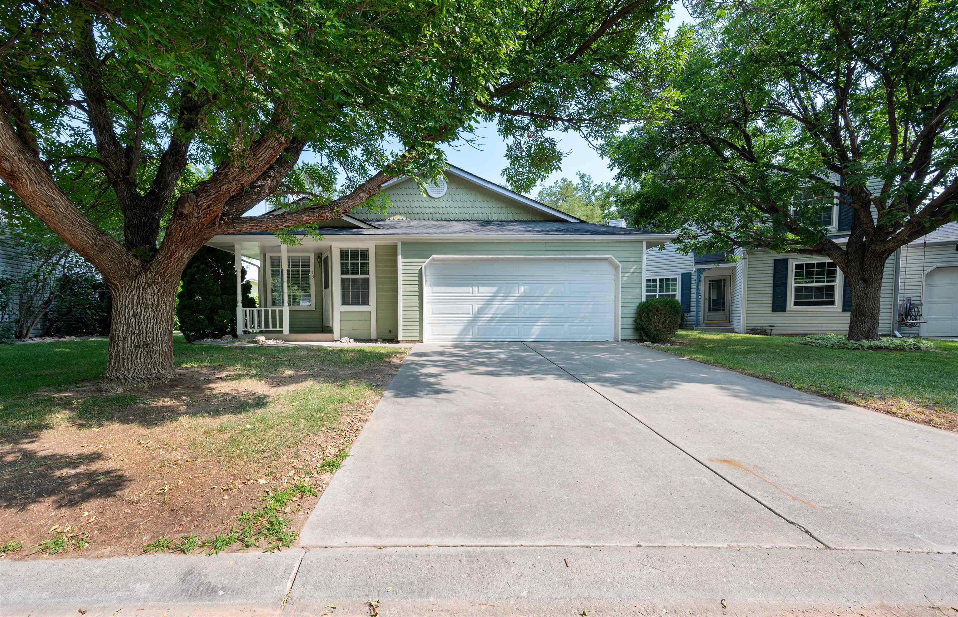 Enjoy seclusion and a convenient Redlands location in the Vineyards subdivision! This clean, 2 bedroom, 1 3/4 bath stand alone home is ready for you to move in. New paint and carpet throughout. Light and bright inside with landscaping and mature trees on the outside. HOA includes landscaping and maintenance, sidewalk snow removal, irrigation, and domestic water. Come see it today!