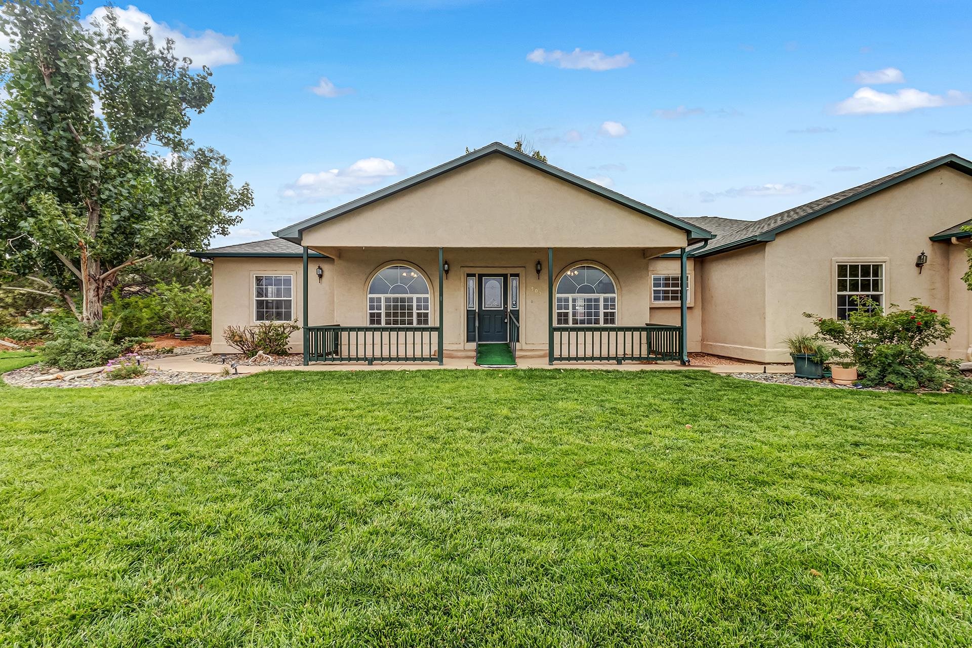 Situated on almost 5 acres, this beautiful 3-bedroom, 2-bathroom ranch style stucco home with an attached 3 car garage not only has incredible 360 degree views but is perfect for those looking for small acreage to bring their horses and 4H animals! Located just minutes from BLM access, this property offers the comforts and style of country living yet just minutes from the City of Grand Junction! Interior features an abundance of cabinet space, granite counter-tops, along with a breakfast bar in the kitchen, gas fireplace in the living area, and big windows throughout. Exterior features a barn with horse stalls, full fencing, RV parking, and so much more! See for yourself everything this home has to offer!