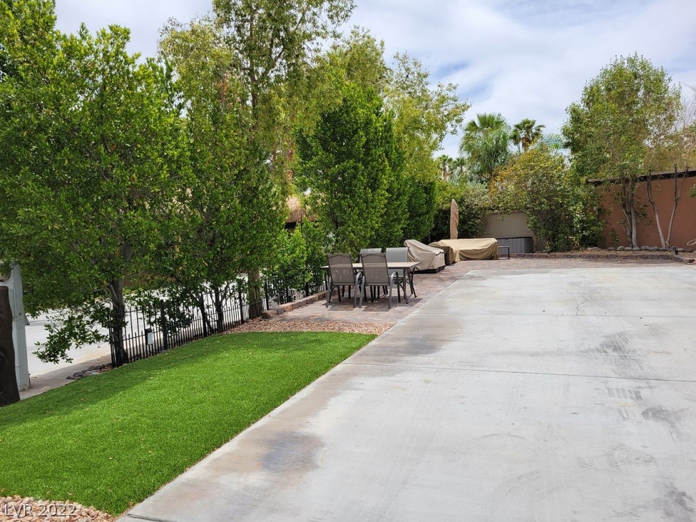 Located within the Class A Las Vegas Motorcoach Resort, this gorgeous site has beautiful mature landscaping for privacy as well as synthetic grass. An extended pad with pavers creates a lot of additional space for seating and entertaining. This is an amazing deal on a site that is ready to be enjoyed!