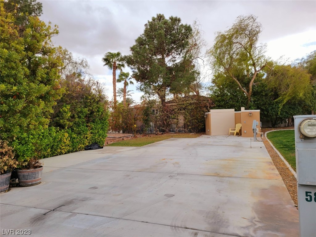 Located in the Guard Gated Las Vegas Motorcoach Resort, this is an Old Town Beauty!    This cozy and private north facing site is full of lush and mature landscaping and features an extended pad, storage units,  and more! Priced for a quick sale!
