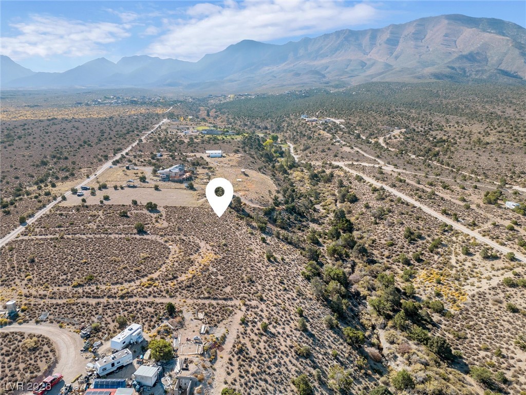 This parcel boasts stunning mountain views and borders USFS land.