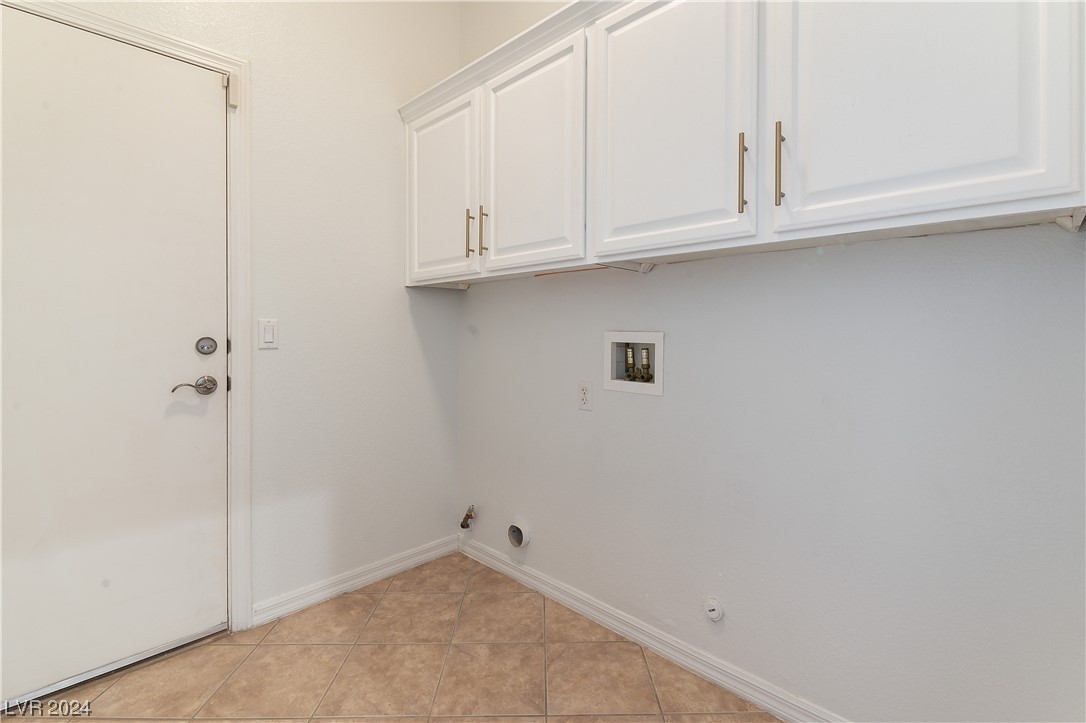 laundry room with access to garage