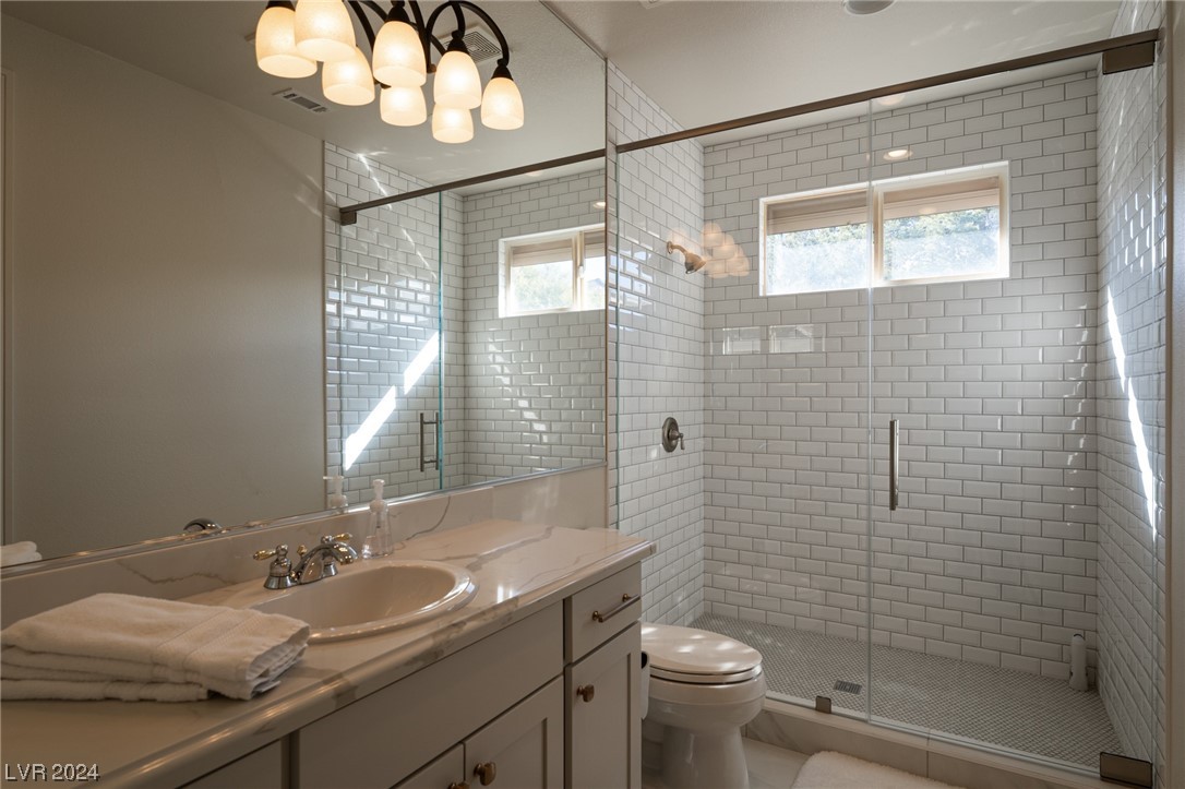 Beautifully renovated 2nd primary suite with walk in shower.