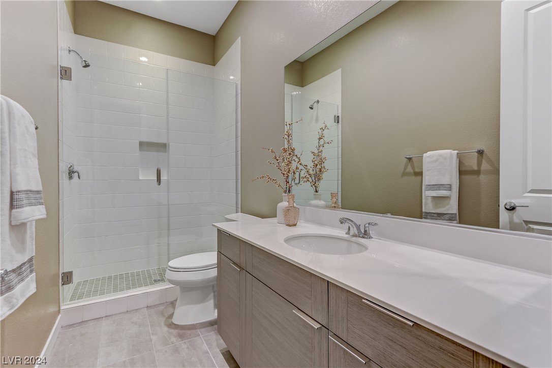 Secondary 3/4 bathroom with walk in shower