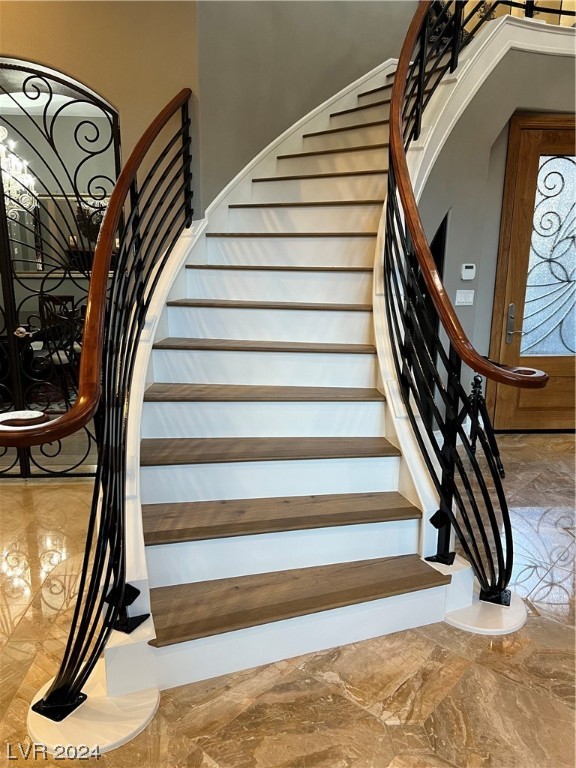 NOTICE THE NEWLY CREATED STAIRS THAT HAVE WOOD ON EACH STEP & WHITE ON THE RISERS, VERY INTRICATELY DESIGNED!