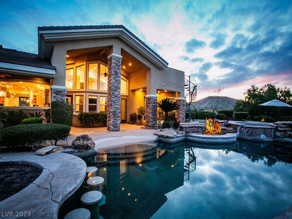 HUGE PRICE REDUCTION!! *REMINDER-IF YOUR ARE JOINING US THIS WEEKEND, TEXT LISTING AGENT YOUR FULL NAME FOR THE GUARD GATE. *REMARKABLE FIND.*Nestled in a CUL-DE-SAC within Henderson's prestigious & most coveted neighborhoods, Anthem Country Club. SINGLE-STORY home perched towards the top of a hill w/stunning views of the iconic LAS VEGAS STRIP & ACC golf course, 14th teebox/hole. PREMIUM GATED street in addition to the GUARD GATE, offering an extra layer of security & exclusivity. Grand entrance with  soaring ceilings. Oversized Heated Pool/Hot Tub-11.5’ DEEP... Dive in! Putting Green, Basketball Court & ROOFTOP Deck. Over 1300 sq ft in basement parking garage & over 5800 sq ft of living space. Create your OWN dream oasis -the way YOU want it. With some vision, you can transform this gem into a masterpiece. Please watch the attached VIDEO.  NOTE:*All Social and golf amenities are optional - great way to make friends & so much fun - and within walking distance from the house!