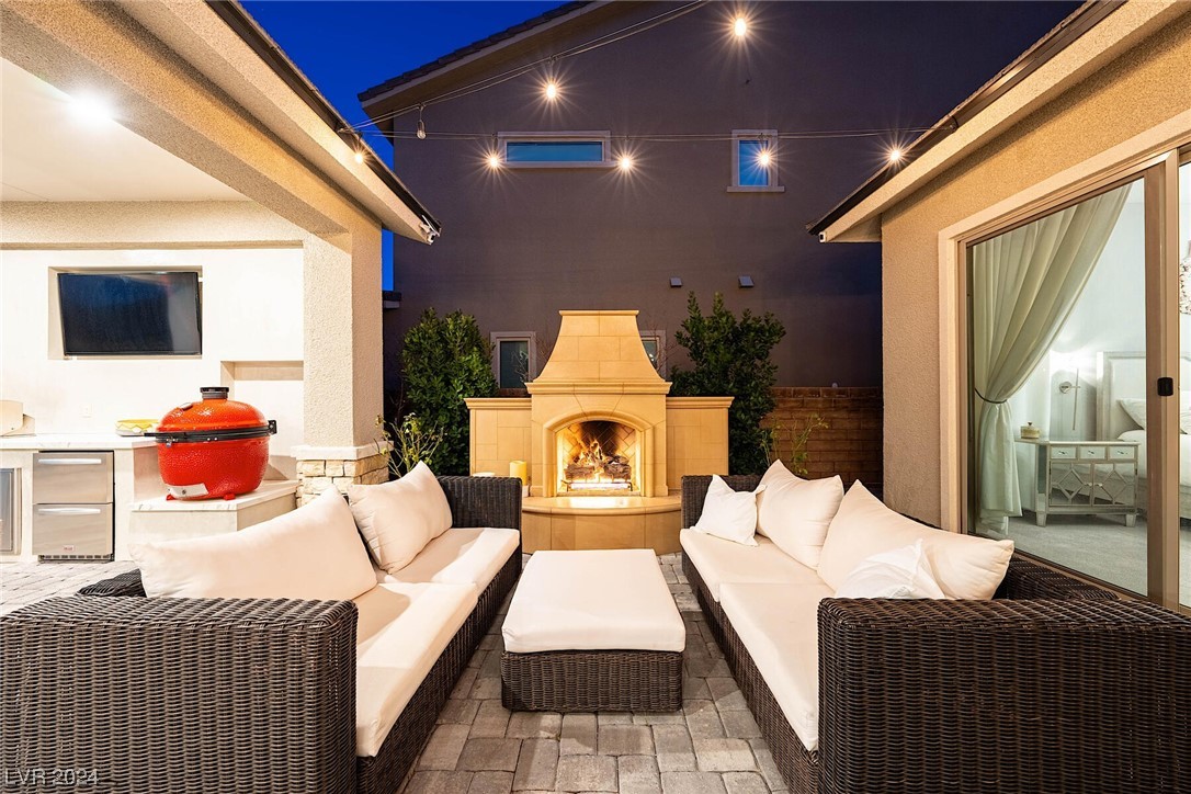 Relax out by your custom fireplace!

P*rimary bedroom has direct access to backyard through slider.