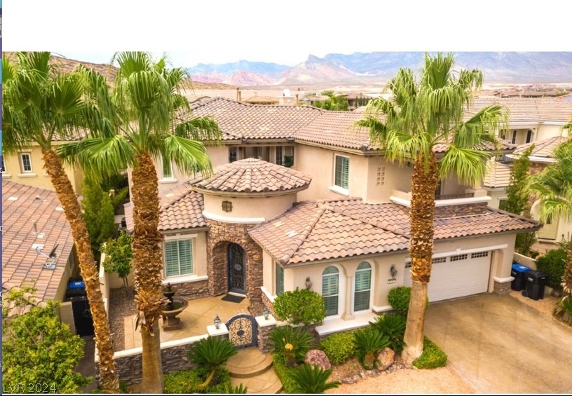 **SEE THE PHOTOS!!** ABSOLUTELY STUNNING TOLL BROS. HOME ON THE GOLF COURSE IN RED ROCK COUNTRY CLUB!   GORGEOUS SPARKLING POOL FOR THE HOT SUMMER AHEAD!  PROPERTY HAS BEEN REMODELED AND HAS AMAZING GOLF COURSE AND MOUNTAIN VIEWS.  NEWER WATERFALL PLUNGE POOL OVERLOOKING FIRST FAIRWAY WITH FULL TIME ROVING SECURITY AND GUARD GATE.  HUGE CHEF'S KITCHEN!!  SLAB GRANITE, EXTENDED ISLAND, BUILT IN GE MONOGRAM FRIDGE, PROFESSIONAL GAS RANGE, 2 OVENS AND WALK IN PANTRY.  GORGEOUS STONE FLOORING ON FIRST FLOOR..NEWLY TILED INDOOR/OUTDOOR COURTYARD, BACK PATIO AND BEDROOM...3 BALCONIES INCLUDES JULIET BALCONY IN COURTYARD...SPACIOUS PRIMARY RETREAT W/HUGE WALK IN CLOSET, BALCONY AND LARGE PICTURE WINDOW WITH ABSOLUTELY STUNNING VIEWS GOLF COURSE AND MOUNTAIN VIEWS.  NEWER PAINT THROUGHOUT ENTIRE HOME!  NEWER BATHROOM REMODELS....MODERN CARPET ON SECOND FLOOR PLUS PLANTATION SHUTTERS.  WASHER/DRYER, STAINLESS STEEL APPLIANCES, CEILING FANS AND A PUTTING GREEN IN BACK YARD WITH REFRESHING POOL!