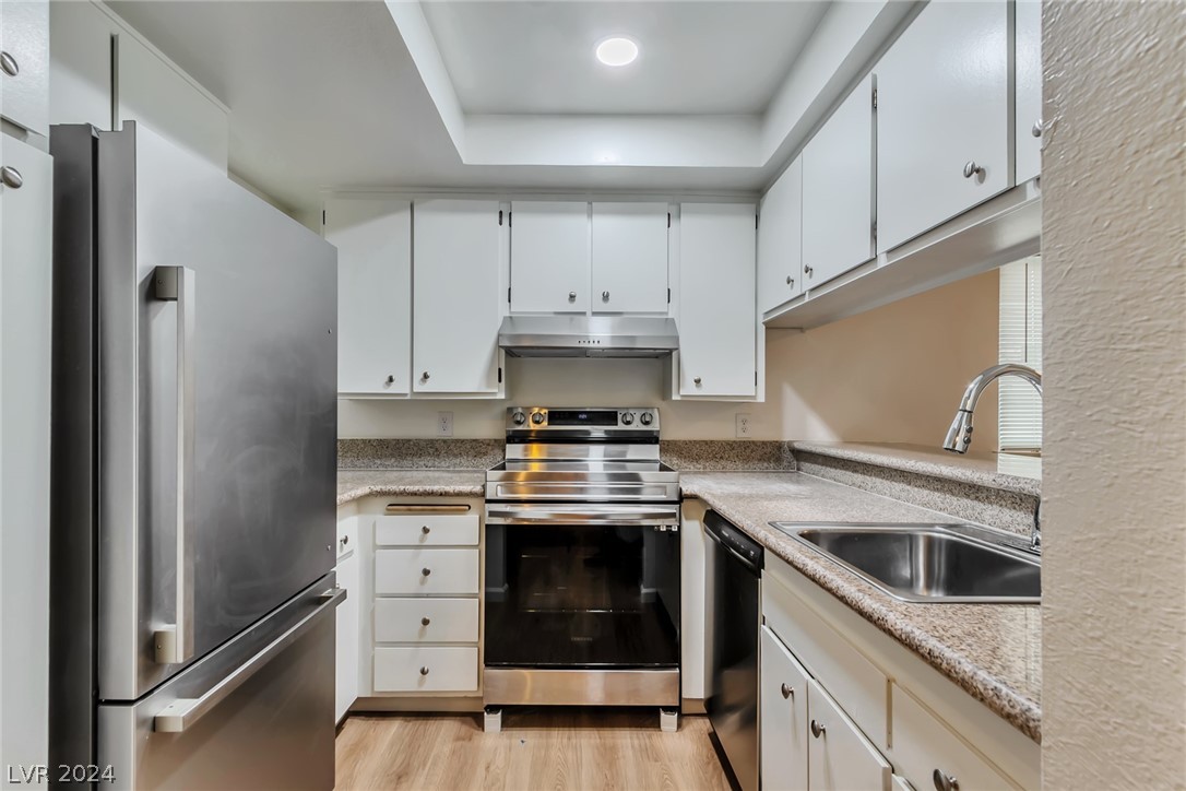 This beautiful updated kitchen with all stainless appliances.