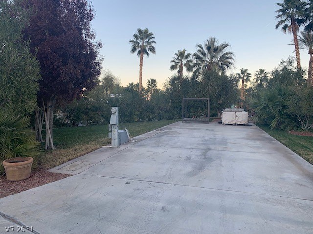 Located in the 24 hour guard gated Las Vegas Motorcoach Resort, this is the first pull-in site for sale in over 3 years!!   This extremely rare pull-in corner site has a decorative stone table and chairs, lush landscaping, plenty of grass, lots of privacy, and an amazing view of the golf putting course, pickle ball courts, and clubhouse!  This one will go quick!