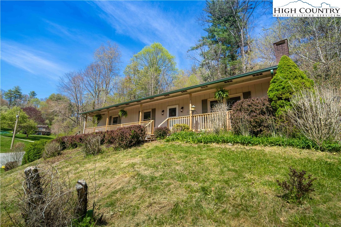 AMAZING updated home located minutes to downtown Boone! This 3 bedroom 2 bathroom home is located perfectly distanced from all Boone has to offer while having enough privacy and serenity of the mountains! This home has had numerous updates recently including a brand new roof (installed 4/15/24) with a transferrable warranty, full kitchen update, bathroom update, landscaping, gas logs replaced, and other touch up work throughout the home over the last year! Prior to that, vinyl flooring was placed throughout the home, some bathroom renovations were started, and a new deck and porch were build. In the basement area there is a fireplace and plumbing set up for an additional bathroom. On top of that, there is an acre of useable land...In Boone! Schedule your showing today!!