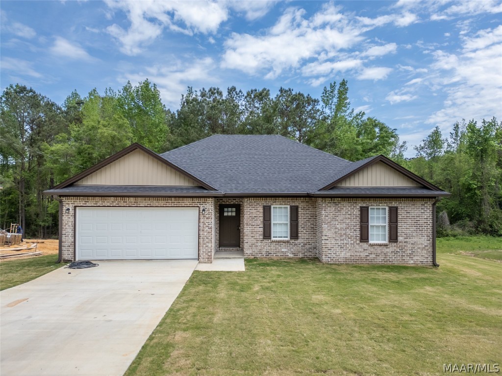 Welcome to 226 Shadow Wood Ln, a charming like NEW home nestled in the heart of Wetumpka, AL. This custom built home was just built in 2023 and the builder paid attention to every detail! With 4 bedrooms, the floor plan matters, and the builder knocked it out of the park! 

It has a split bedroom plan for added privacy and an open floor plan where the kitchen opens into the living area. There is luxury vinyl plank throughout, nevermind having to deal with keeping carpet clean or allergies! The living room has an electric fireplace, making it a cozy focal point when you walk through the front door. The kitchen has stainless steel appliances, a large island, granite countertops, a breakfast bar, soft close cabinets, and an eat in kitchen area. 

The master suite is a relaxing retreat with its trey ceilings, a private ensuite bathroom, complete with a soaking tub, a separate walk in shower, and a dual granite topped vanity. Outside, the backyard is a haven for outdoor living, with a deck perfect for grilling and lounging on sunny days. The lush greenery and tranquil surroundings create a peaceful atmosphere for outdoor gatherings or simply unwinding after a long day. Trees line the back of the yard, adding additional privacy. The yard is fully fenced in with a black, chain link fence, as to not take away from the beauty of the wood line. 

Located in a desirable neighborhood, 226 Shadow Wood Ln offers the convenience of nearby amenities while still providing a sense of privacy and serenity. With its modern design, functional layout, and prime location, this home is ready to welcome its new owners into a life of comfort and style. Call for a showing today!