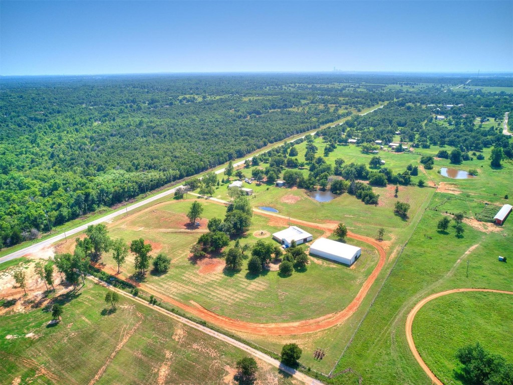 12677 NE 63rd Street, Spencer, OK 73084 birds eye view of property featuring a water view