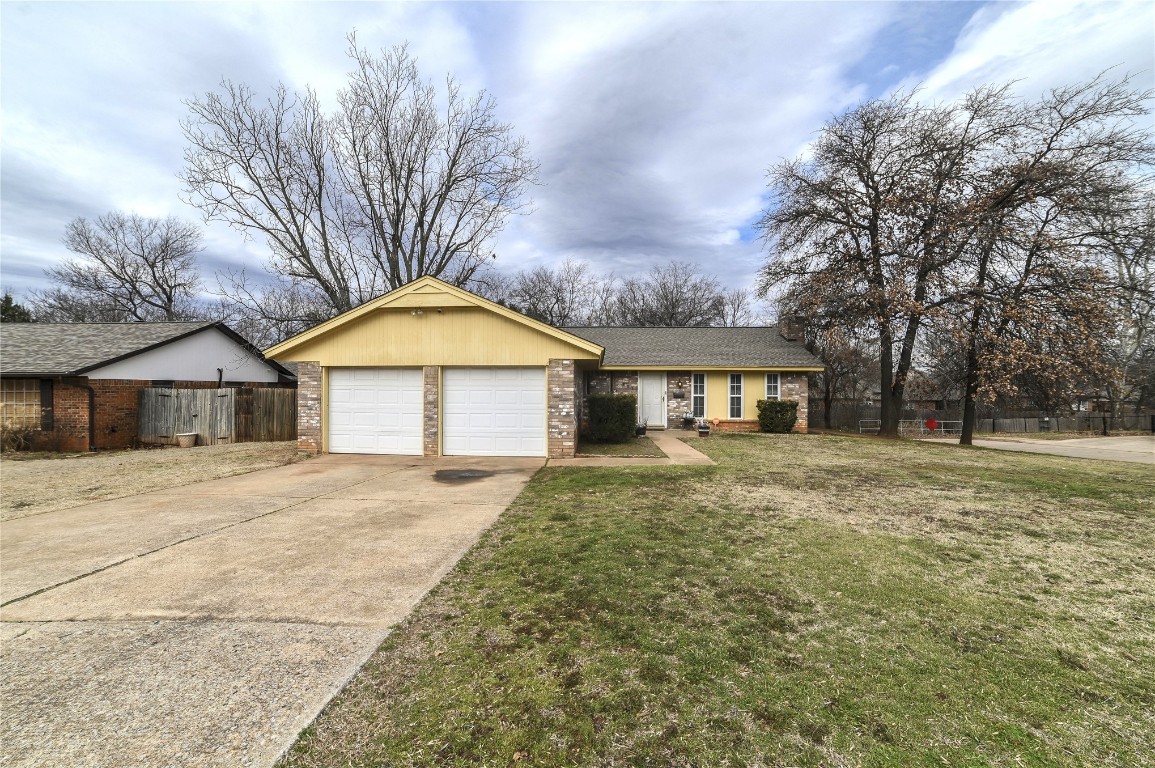 This charming house offers 3 bedrooms 2 bathrooms, fireplace, 2 car garage and sits on a corner lot. This home is waiting for your touch, located  in a quiet neighborhood. Make this Your home!. Schedule your showing TODAY!.