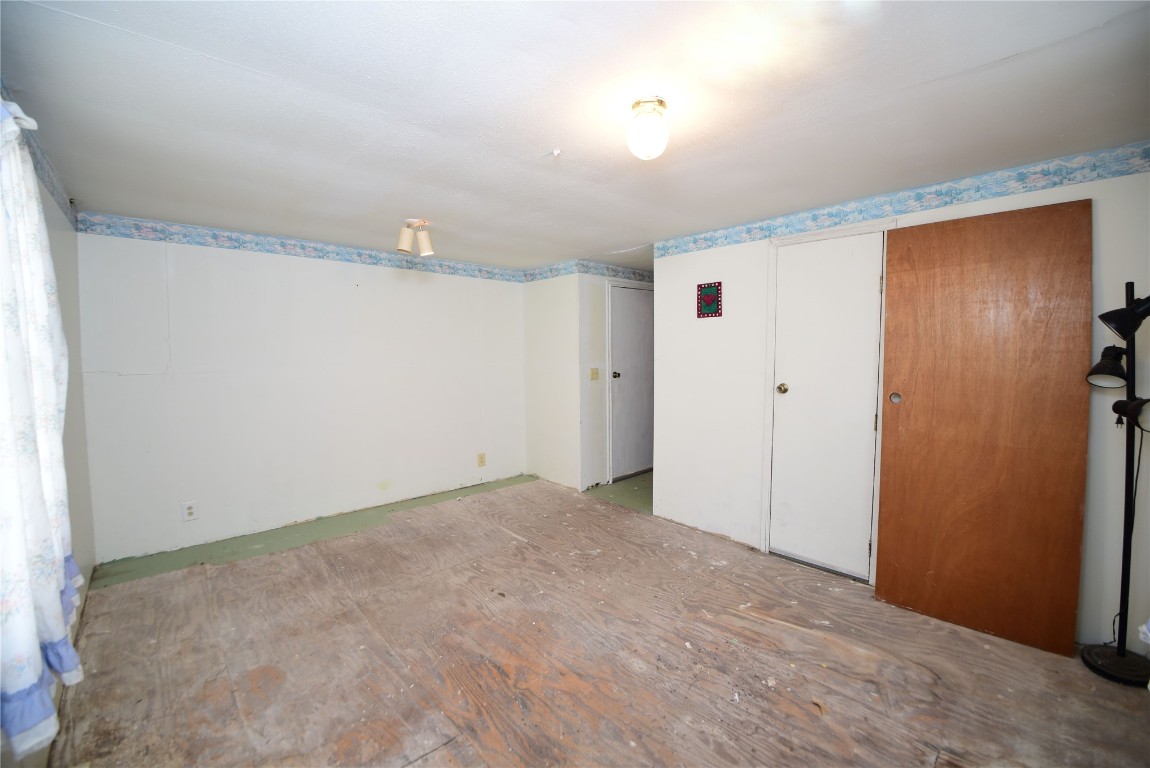 149 S 7th Street, Porter, OK 74454 unfurnished bedroom with a closet