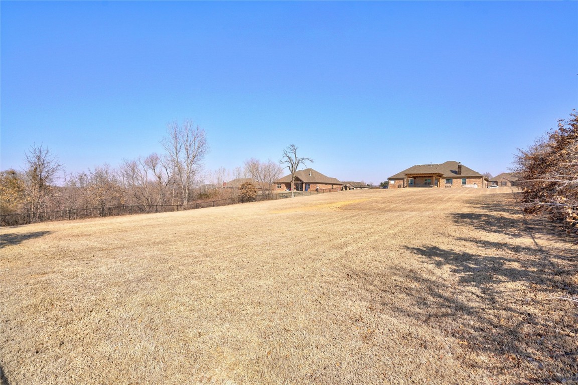 145 Oakridge Drive, Choctaw, OK 73020 view of yard