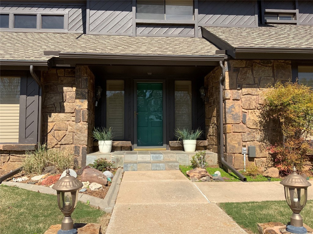 10717 Woodridden, Oklahoma City, OK 73170 view of doorway to property