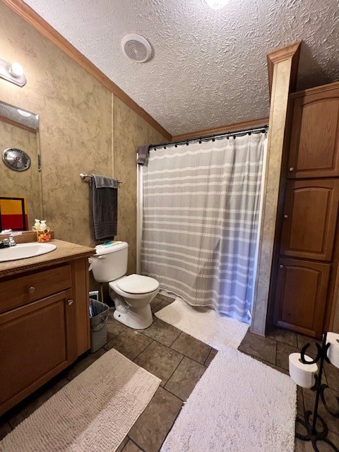 69473 Elmer Self Lane, Smithville, OK 74957 bathroom featuring tile floors, vanity, crown molding, and toilet
