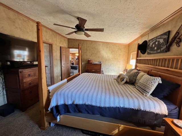 69473 Elmer Self Lane, Smithville, OK 74957 carpeted bedroom with ornamental molding, ceiling fan, and a textured ceiling