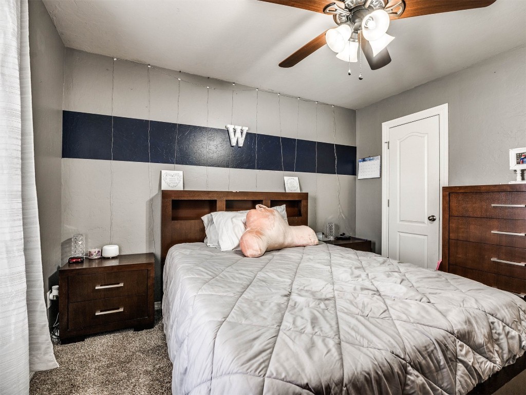 4216 Stardust Lane, Tuttle, OK 73089 bedroom with ceiling fan and carpet