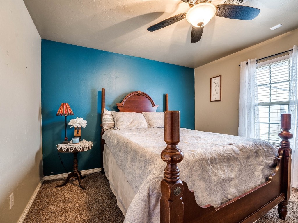 4216 Stardust Lane, Tuttle, OK 73089 carpeted bedroom with ceiling fan