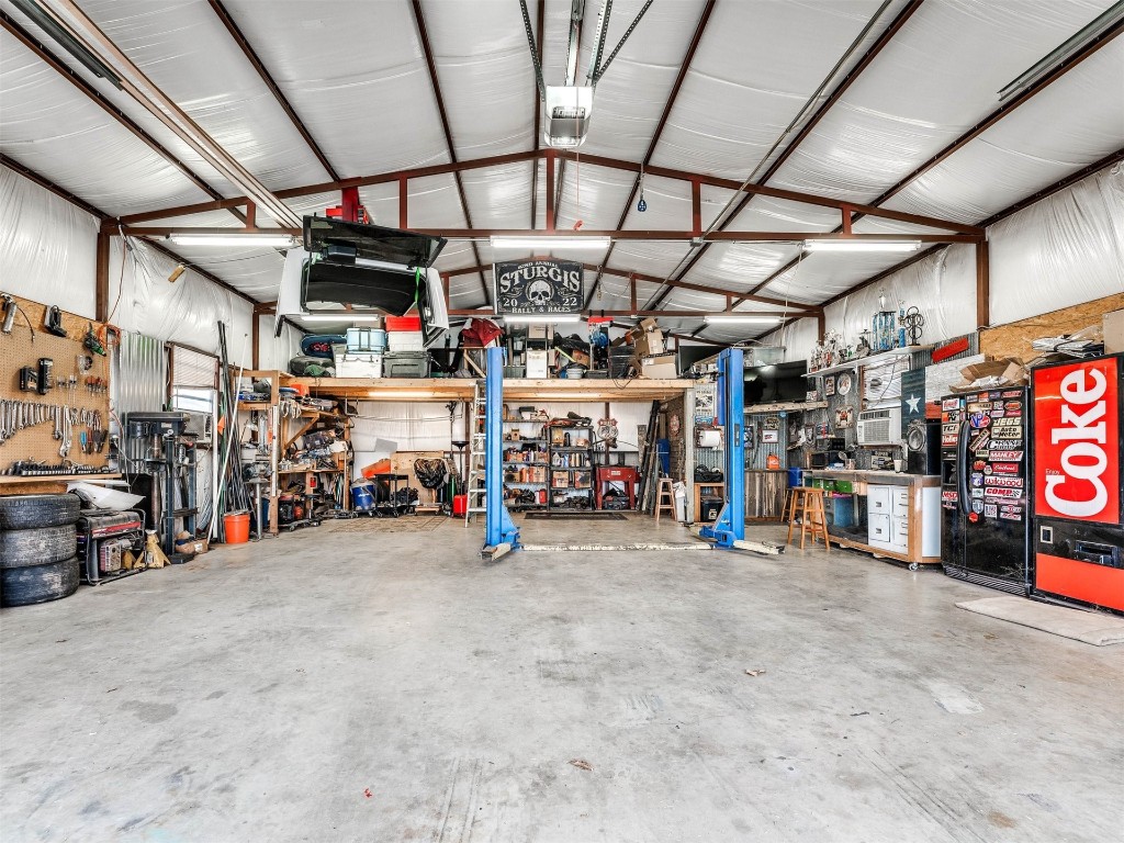 4216 Stardust Lane, Tuttle, OK 73089 garage featuring a workshop area
