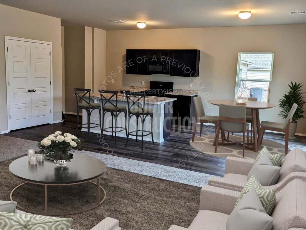 1128 Stallion Drive, Guthrie, OK 73044 living room featuring dark hardwood / wood-style flooring