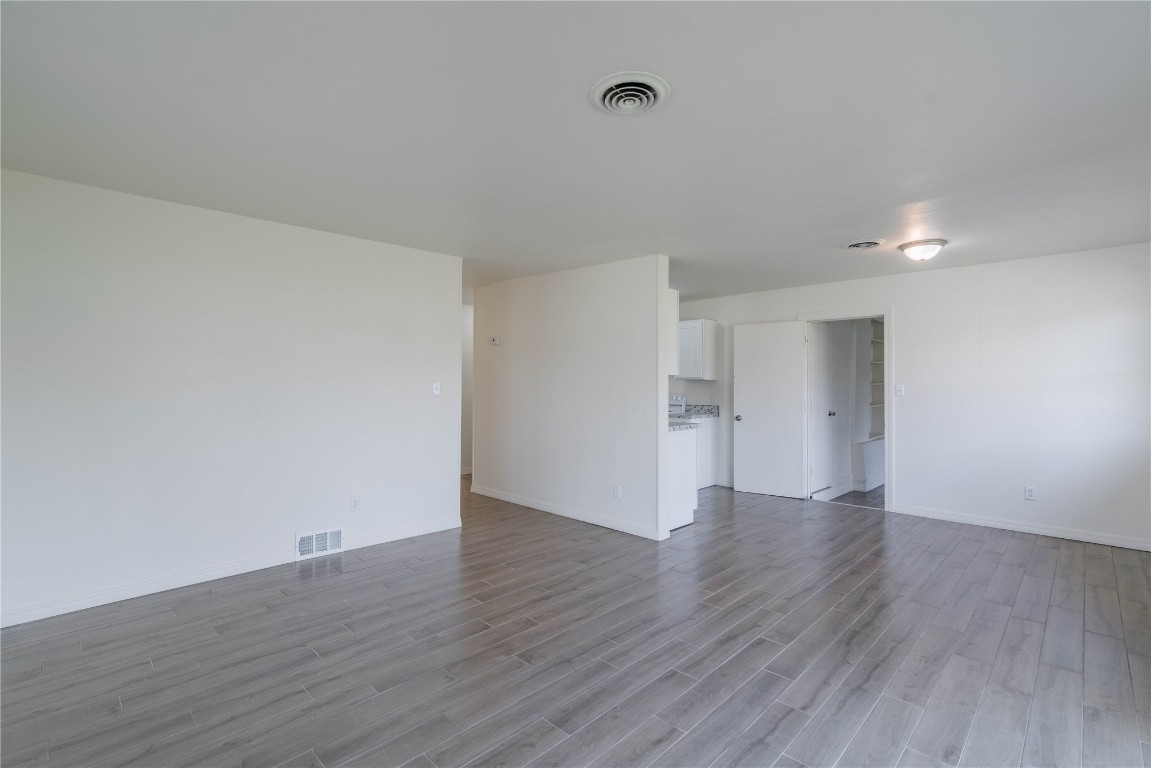 1417 NW 102nd Street, Oklahoma City, OK 73114 empty room featuring light wood-type flooring