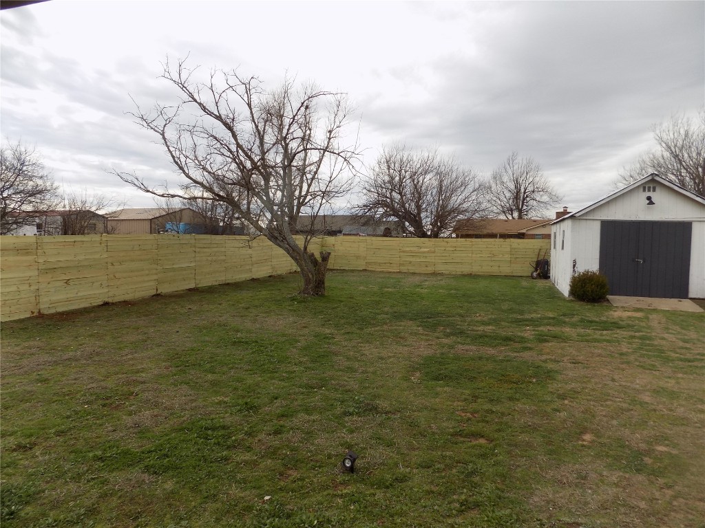 2706 CS 2831, Chickasha, OK 73018 view of yard with a storage shed