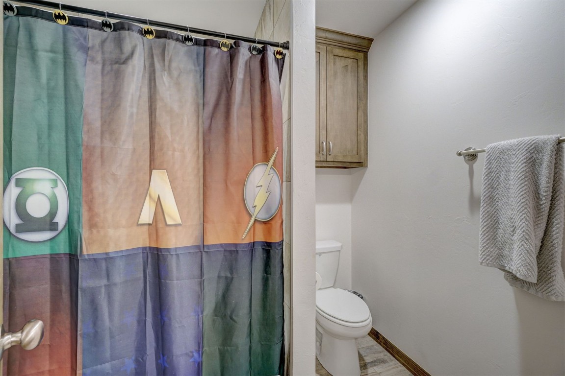 5851 Starry Night, Piedmont, OK 73078 bathroom featuring toilet