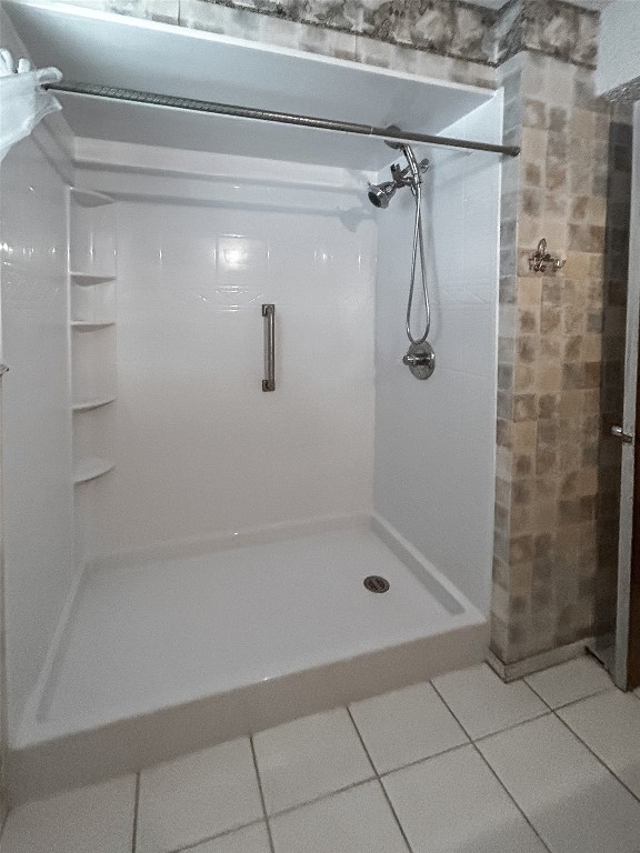 805 SW 67th Street, Oklahoma City, OK 73139 bathroom featuring tile flooring and tiled shower