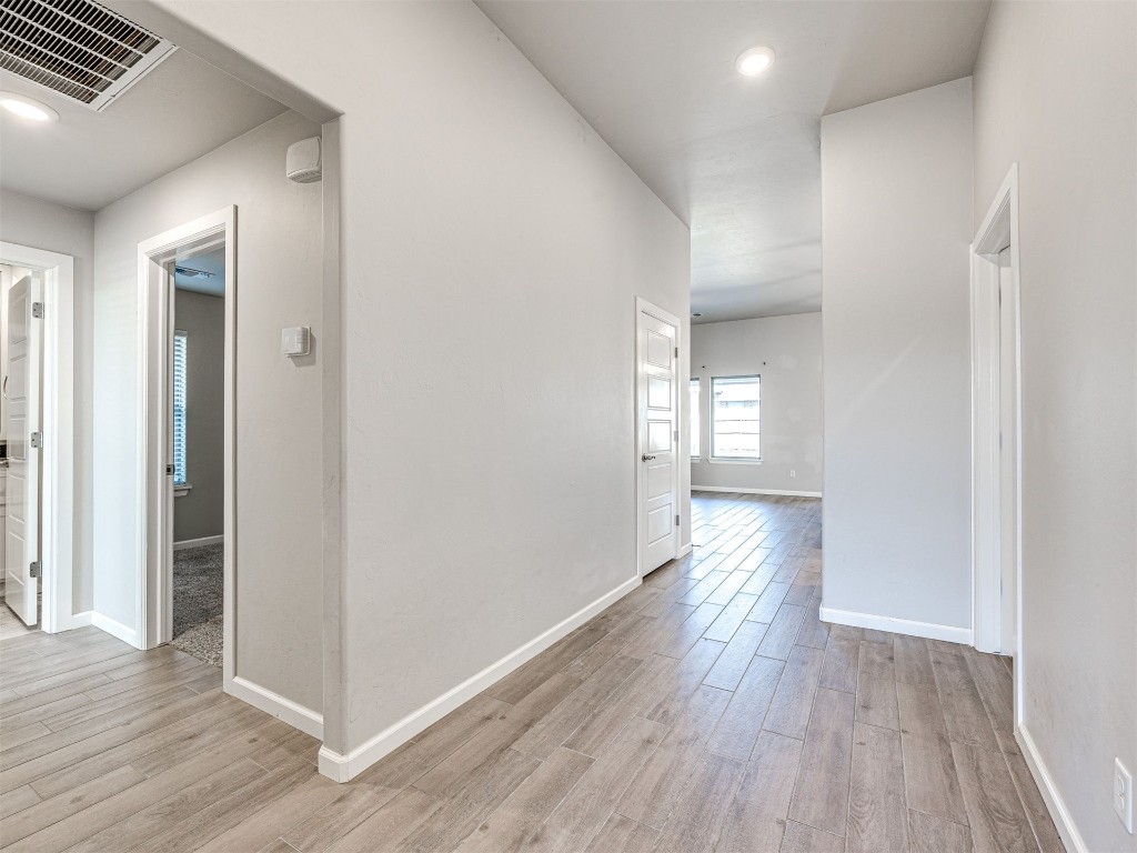 3337 NW 187th Street, Edmond, OK 73012 corridor with light wood-type flooring