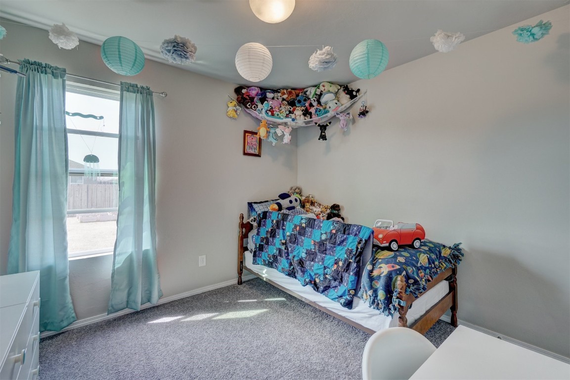 1316 Peridot Lane, Noble, OK 73068 bedroom with carpet floors