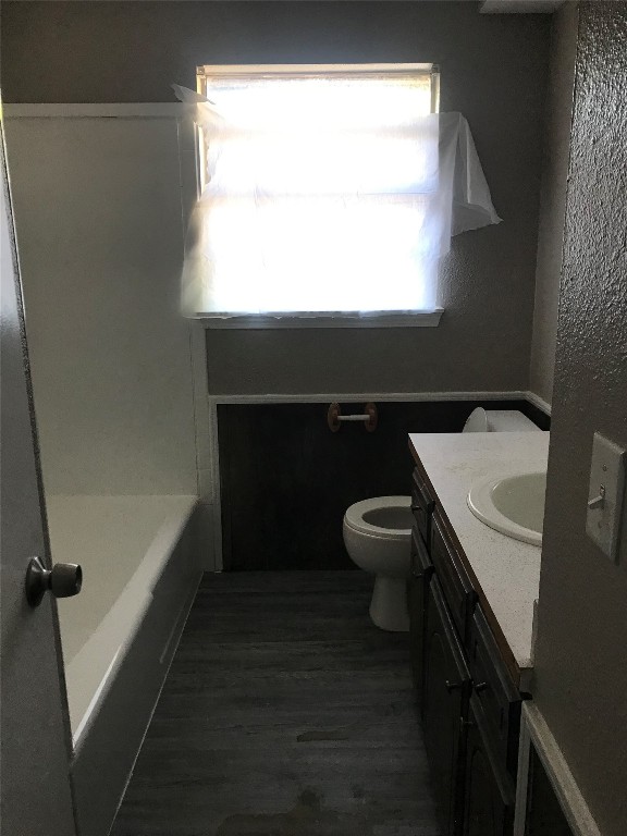 1501 Marydale Avenue, Midwest City, OK 73130 full bathroom with shower / bathing tub combination, toilet, and vanity