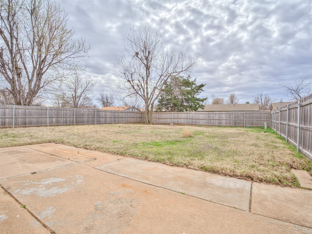 8416 NW 92nd Street, Oklahoma City, OK 73132 view of yard with a patio