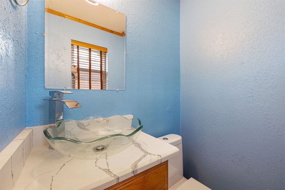 1804 NE 53rd Street, Oklahoma City, OK 73111 bathroom with vanity and toilet