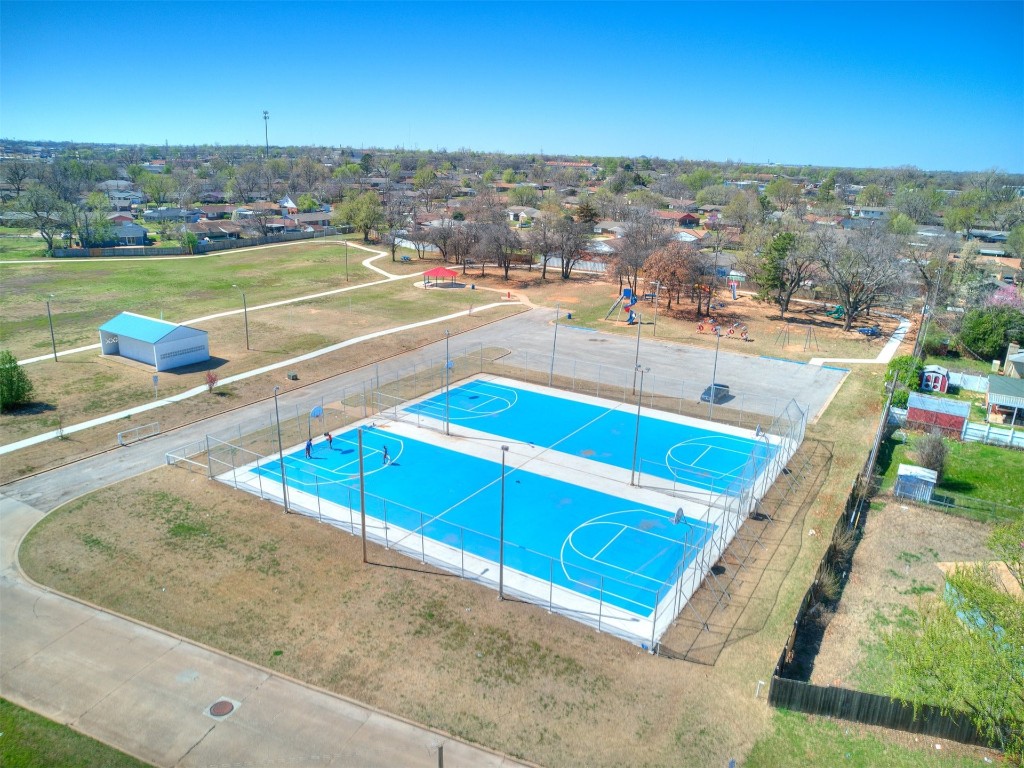 3421 Simmons Drive, Del City, OK 73115 view of pool with basketball court